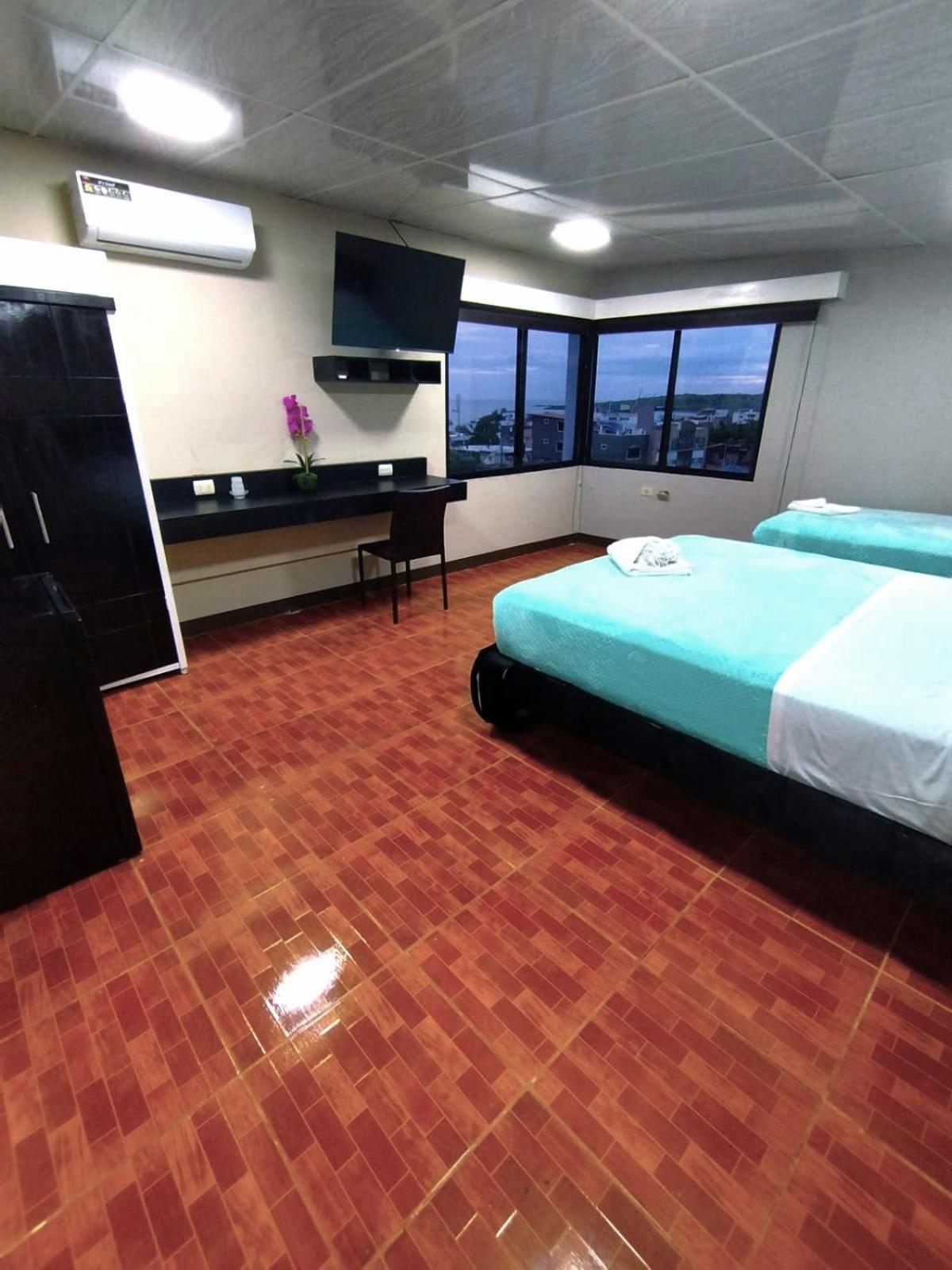 Hotel Los Algarrobos ปูแอร์โต บาเกริโซ โมเรโน ภายนอก รูปภาพ