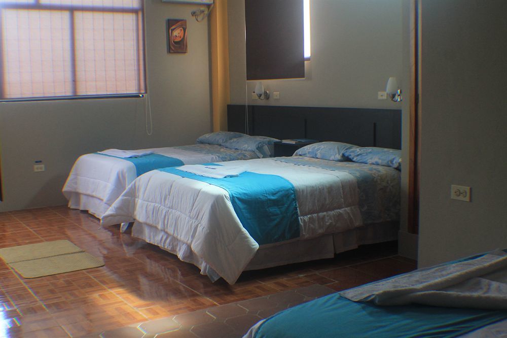 Hotel Los Algarrobos ปูแอร์โต บาเกริโซ โมเรโน ภายนอก รูปภาพ